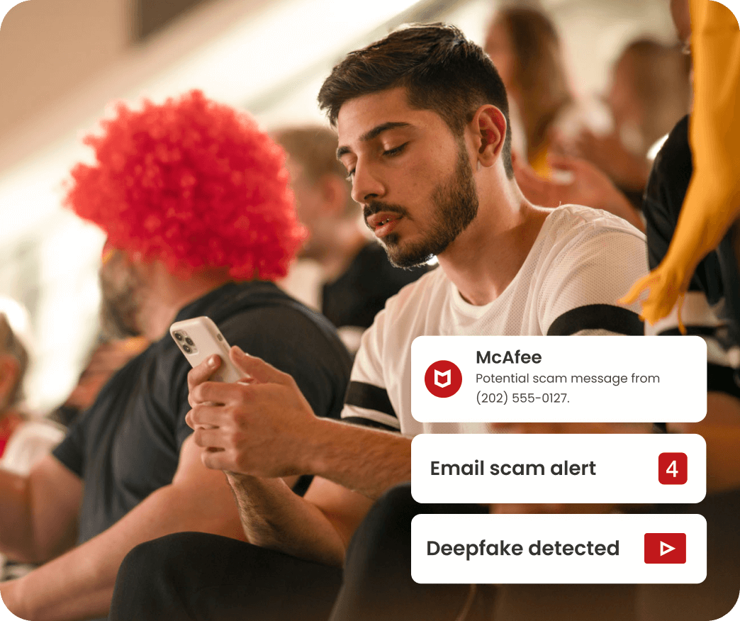 Person using a smartphone with McAfee scam warning, email scam alert, and deepfake detected notifications displayed.