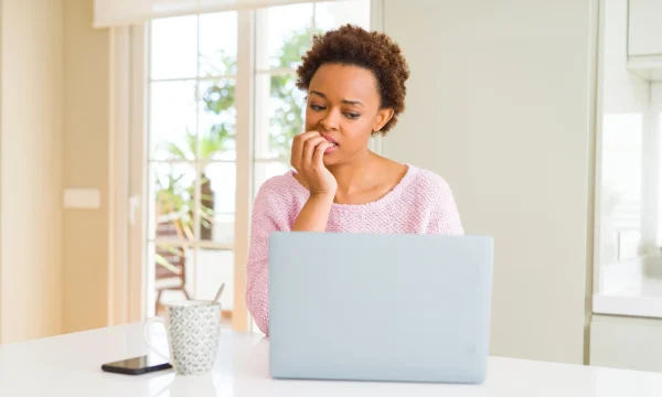 woman-deciding-on-her-online-purchase